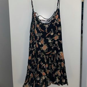 Spaghetti strap floral top with lace up back